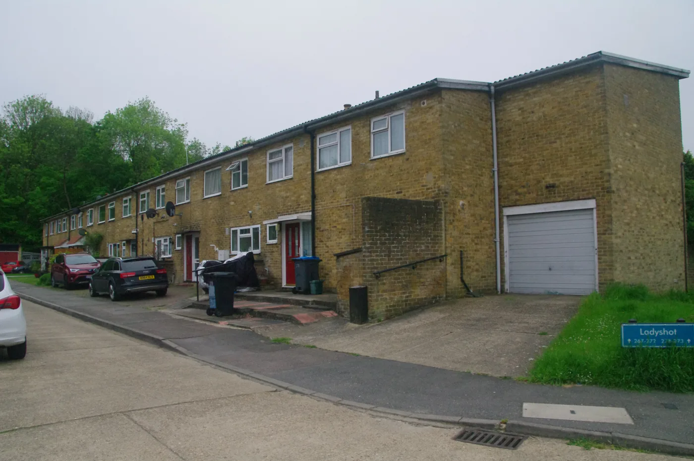Terraced houses in Ladyshot, Harlow. The council's own '£4.93 a week' figure is the Band C charge for its services, not Band D, which is £5.55